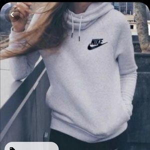 Nike rally funnel hoodie with small side pockets